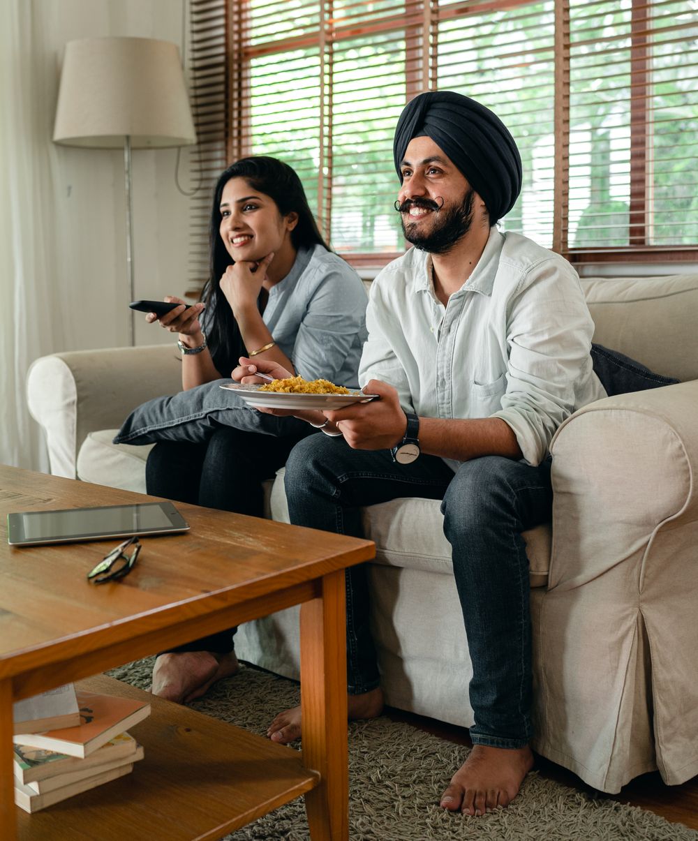 Family relaxing comfortably at home